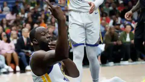 Draymond Green and Courtside Fan Exchange Words