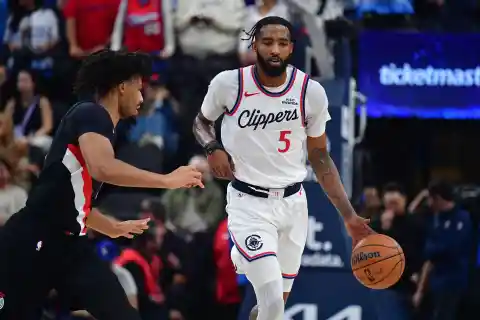Derrick Jones Carried Off The Court After Collision With Jaylen Brown